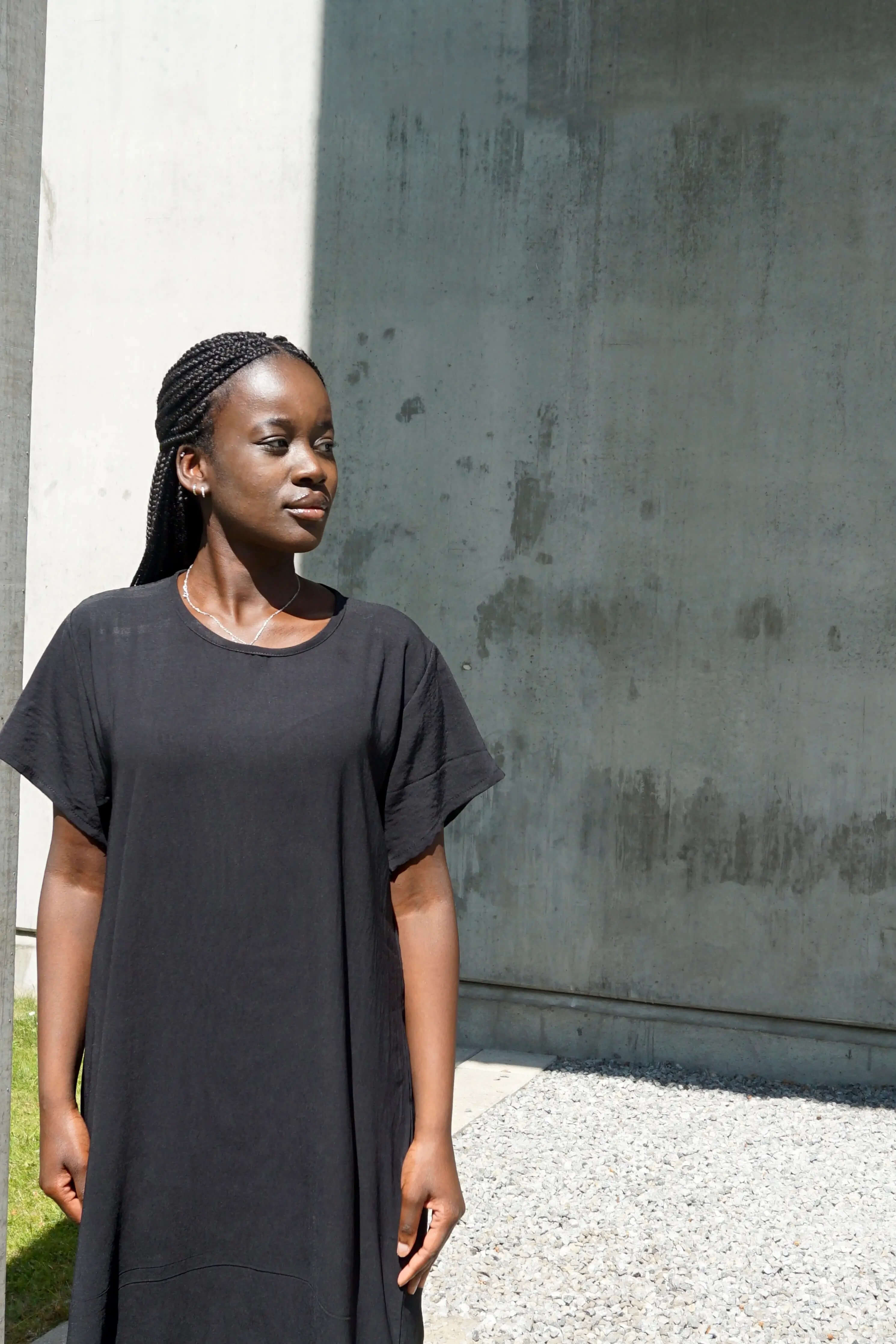 Closeup of short sleeve maxi dress in black 